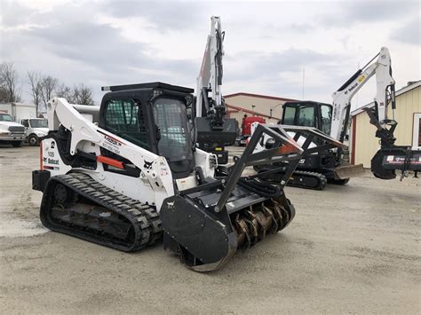 bobcat tracked skid steer with deforester attachment rental near me|mini skid steer attachment rental.